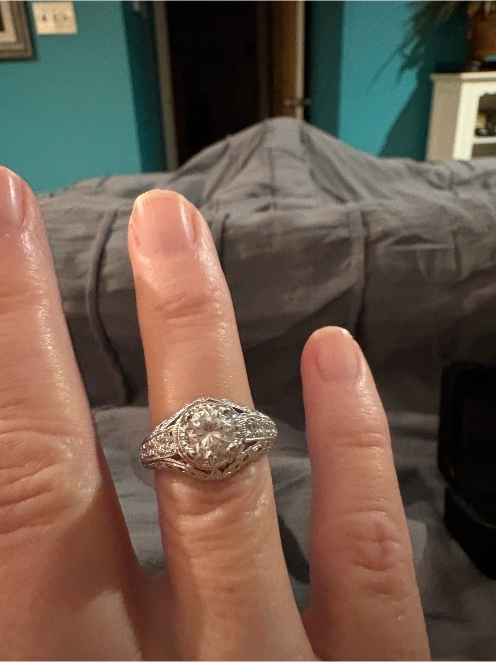 Vintage-Inspired Silver Engagement Ring with Clear Center Stone